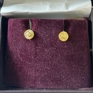 Gold coloured circle studs